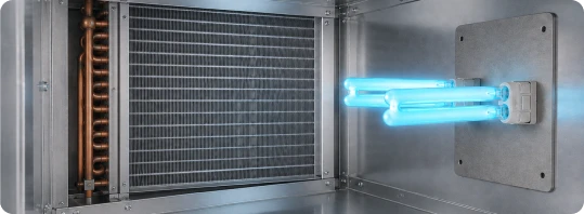UV-C unit mounted beside the coil inside an air handler cabinet