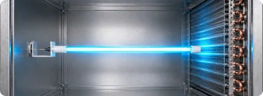UV-C lamp casting light straight along the length of the coil